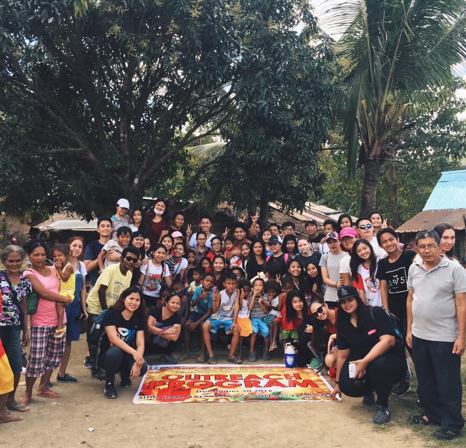 College of Subic Montessori students and community members during an outreach program