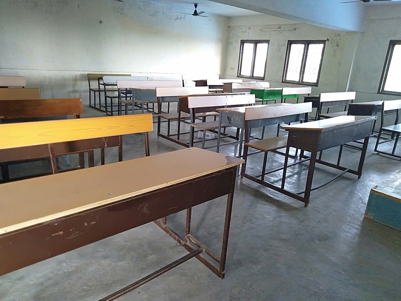 An empty classroom prepared for elementary learning